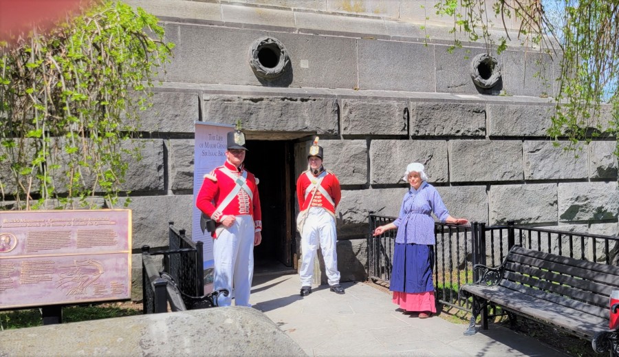 Opening day for Brock's Monument. Dressed in historic costume are students Andrew Laliberte of Brock University and Patrick Smith of the University of Waterloo, and Louise Leyland, on May 14. (Tony Chisholm)