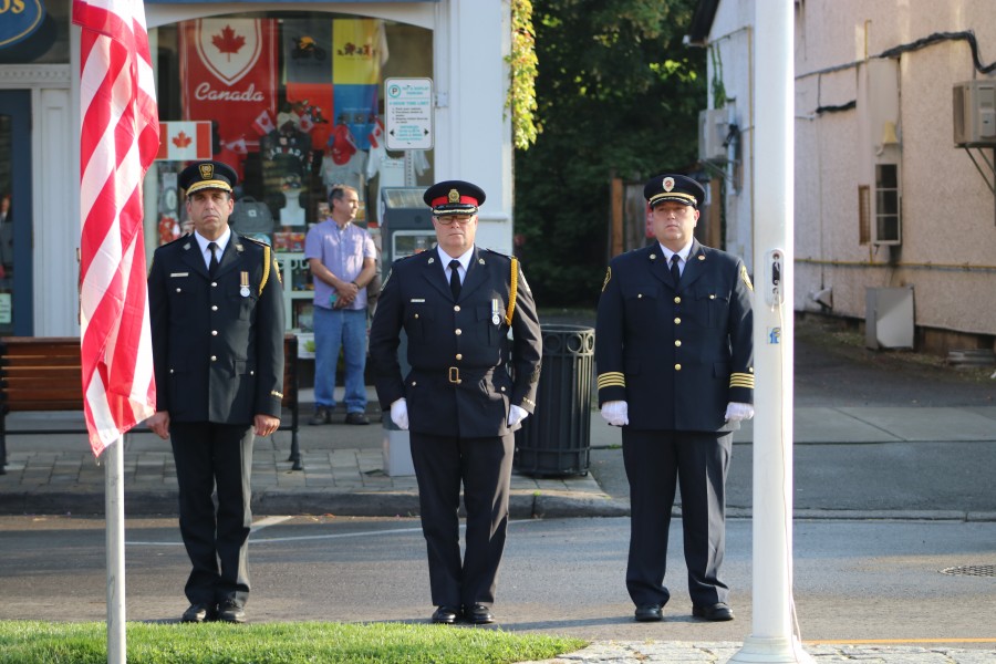 Niagara EMS chief Kevin Smith, Niagara Regional Police deputy chief Brett Flynn and NOTL fire chief Nick Ruller at the memorial service. (Dariya Baiguzhiyeva/Niagara Now)